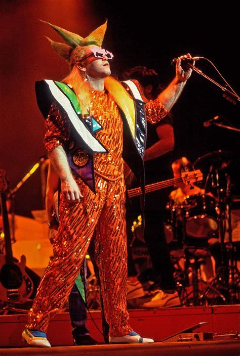 Rock it, man: Elton John s fashion evolution | Elton john fashion ...