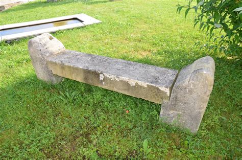 Rustic stone garden bench in antique limestone