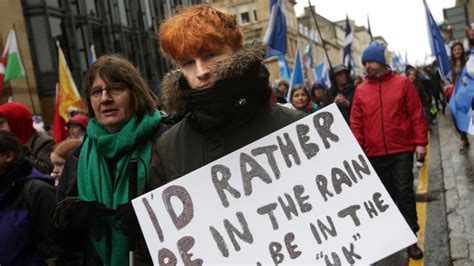 Scottish independence supporters march through rainy ...