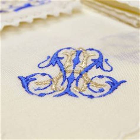 Servizio da messa 4 pezzi  simbolo mariano argento/blu , in misto lino ...