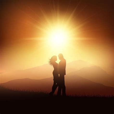 Silhouette of a couple in a sunset landscape   Download ...