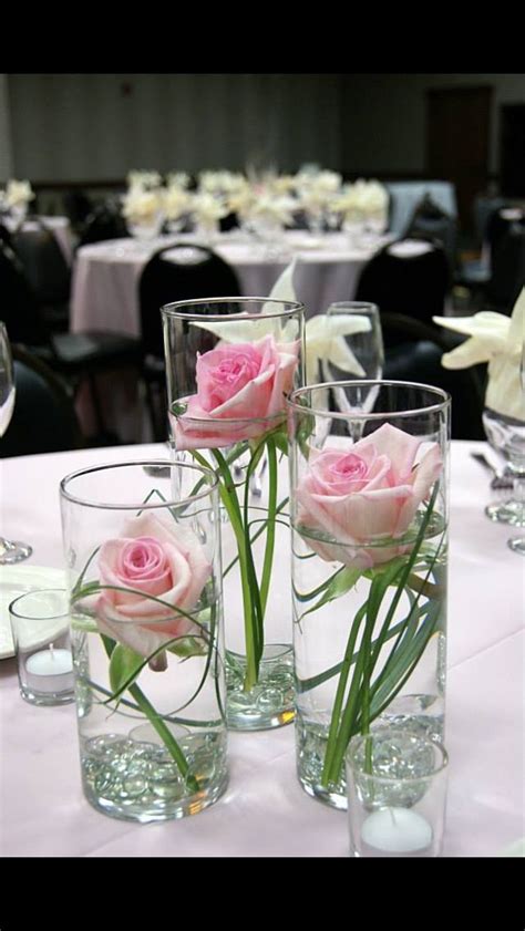 Single flowers in skinny vases in 2020 | Wedding table ...