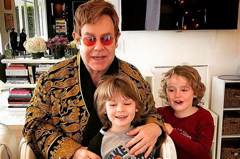 Sir Elton John slammed for saying his sporty sons are  real boys  who ...