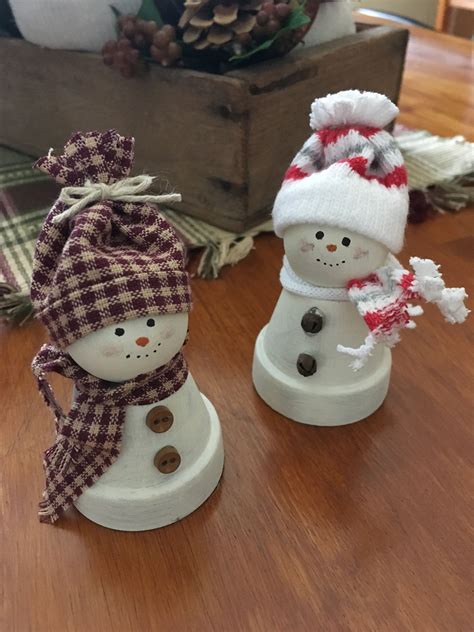 Snowmen made from mini clay pots | Easy homemade christmas ...