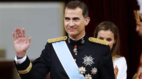 Spain s new King Felipe VI seeks to inspire country hit by ...