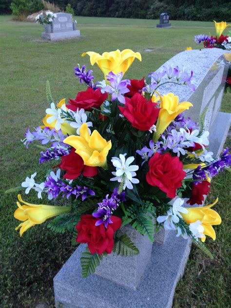 Spring/Summer cemetery vase using yellow lilies, red roses ...