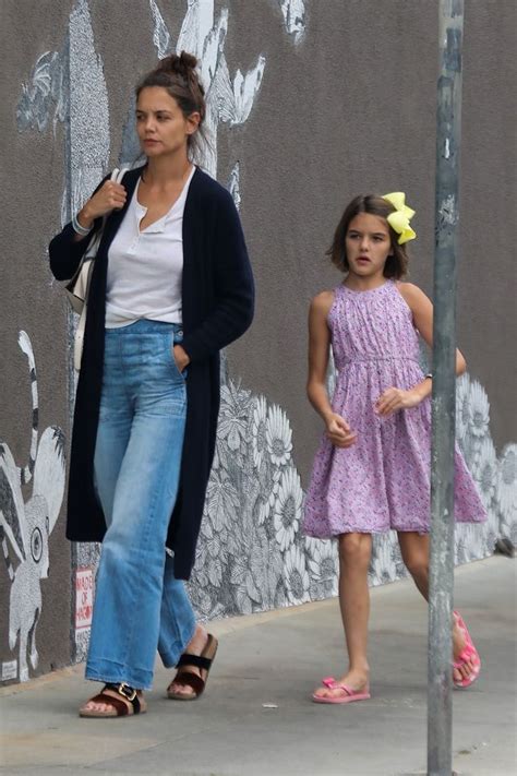 Suri Cruise is all grown up as she joins mum Katie Holmes ...