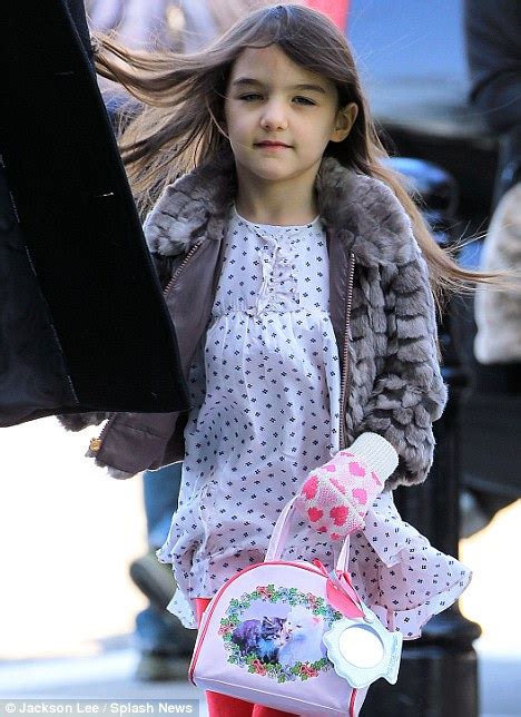 Suri is starting to really resemble Tommy