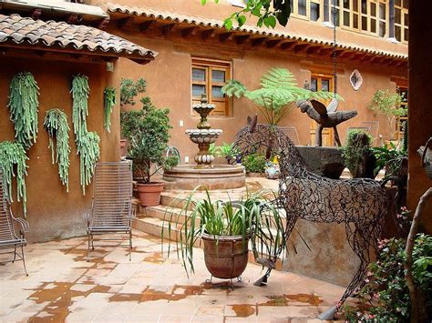 The courtyard at La Casa Encantada, a Colonial hotel in ...