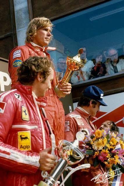 The podium, Niki Lauda  AUT  Ferrari, second; James Hunt ...