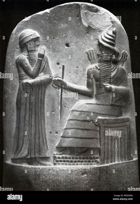 The sculpted figure at left is Hammurabi, standing before Shamash Stock ...