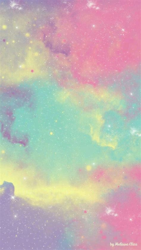 the sky is filled with colorful clouds and stars
