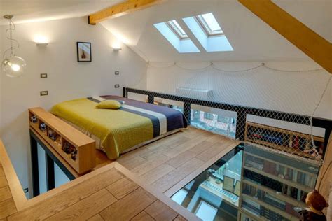 This lofted bedroom boasts a glass floor   Living in a shoebox