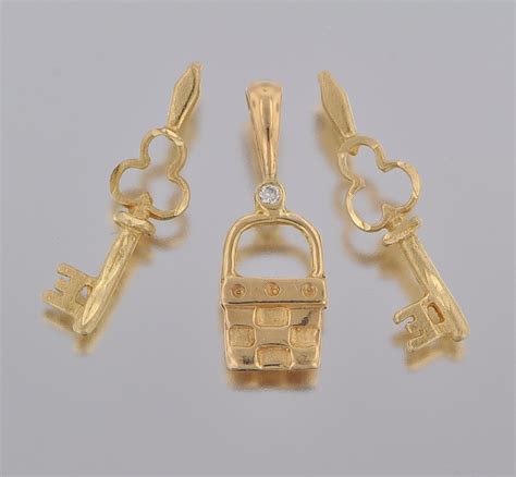 Three 14k Gold Charms , 03.05.10, Sold: $143.75