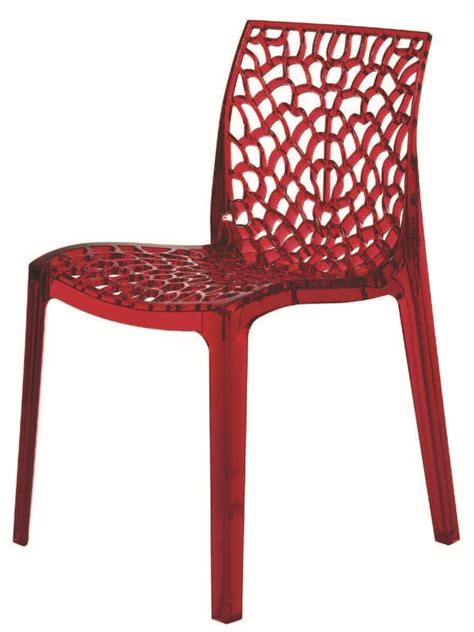 Transparent perforated plastic chair suited for outdoors ...