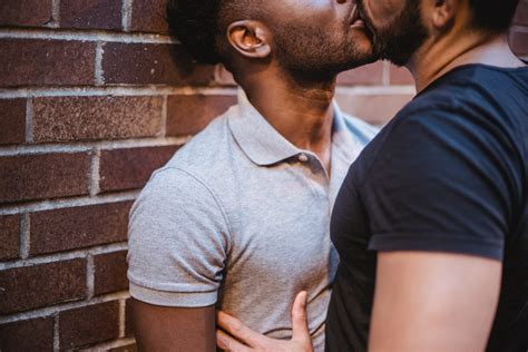 Two Men Kissing · Free Stock Photo