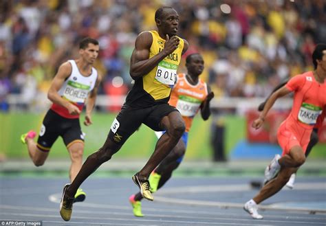 Usain Bolt laughs with Canada s Andre De Grasse during the ...