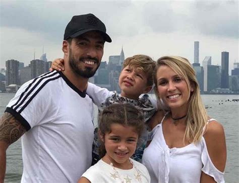 What did Messi and Luis Suárez and their families do on ...