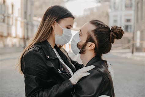 Why are there so many stock photos of people kissing while wearing face ...